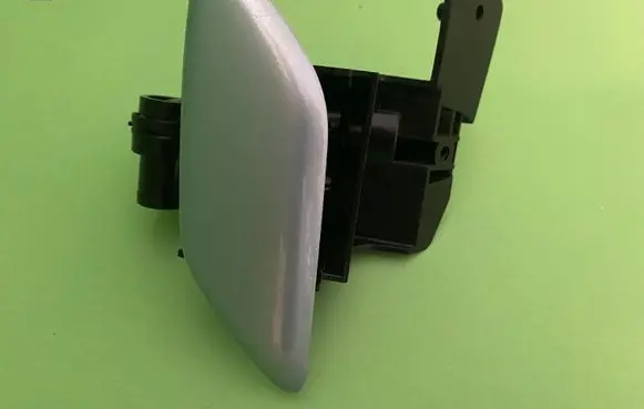 Headlight washer spray nozzle