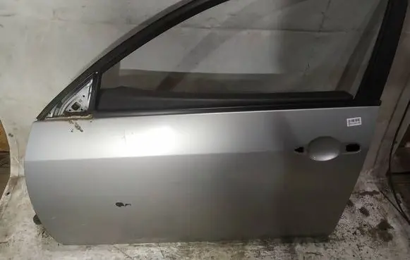 Nissan Primera Front door pilkos