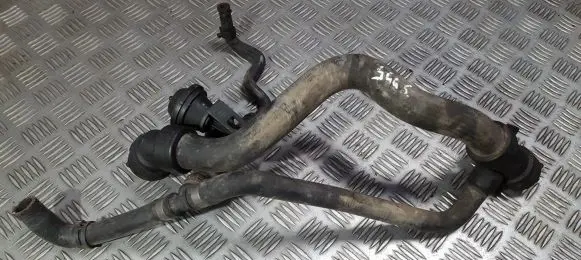 Volkswagen PASSAT B5 Engine coolant pipe/hose