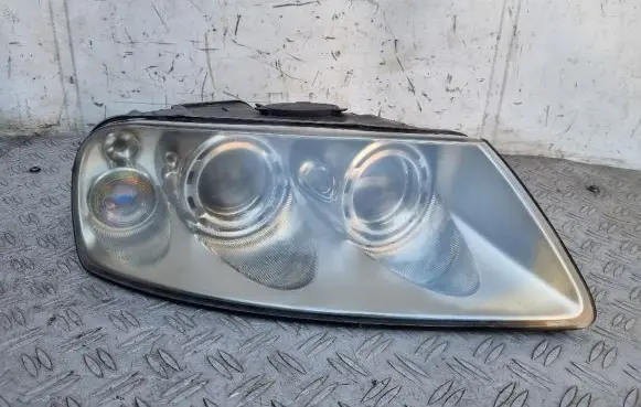 Volkswagen Touareg I Headlight/headlamp 7L6941016BK 89307861
