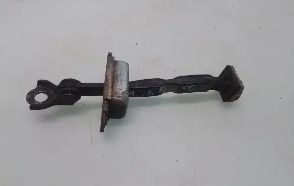 Rear door check strap stopper