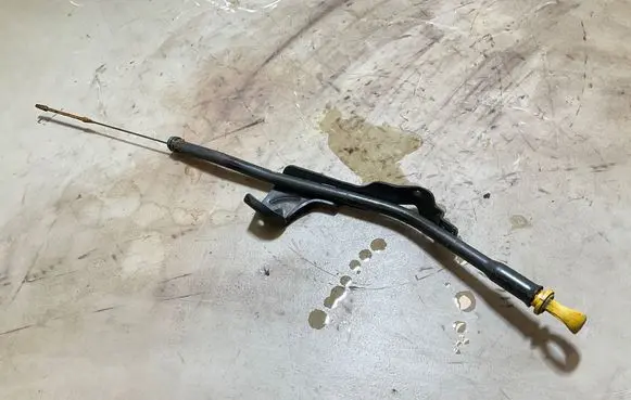 Oil level dip stick