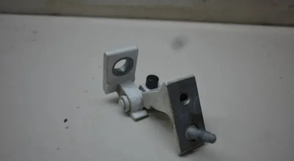Rear door upper hinge