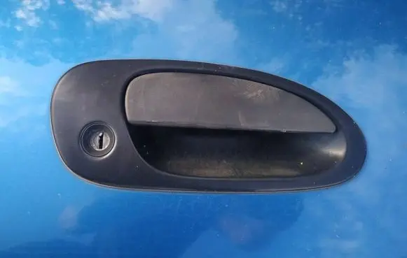 Mazda 323 Front door exterior handle