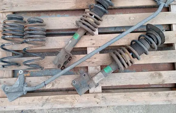 Mitsubishi Colt Set of springs and shock absorbers (Front and rear) 29213HA