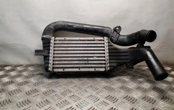 Opel Zafira A Intercooler radiator 99000037 8ML376723