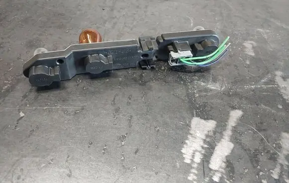 Tail light bulb cover holder