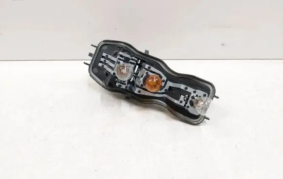 Tail light bulb cover holder