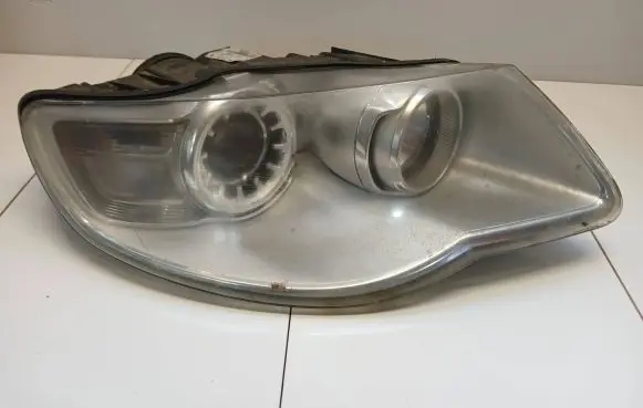 Volkswagen Touareg I Headlight/headlamp 7L6941032A 1LL24703204 24703204000059