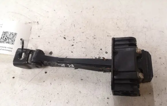 Front door check strap stopper