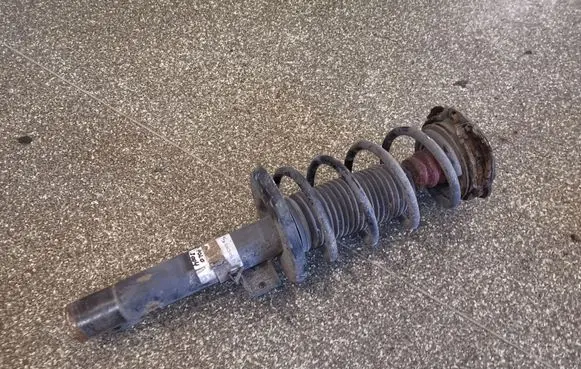 Volkswagen Polo Front shock absorber with coil spring