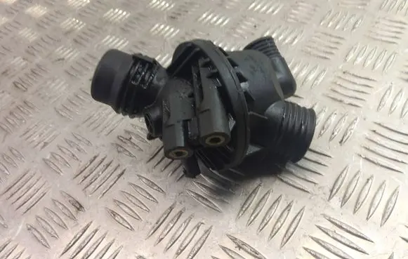 Thermostat/thermostat housing