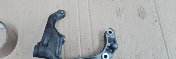 Audi S5 F5 A/C compressor mount bracket 06M260885M