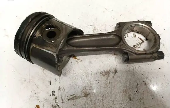Piston with connecting rod