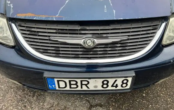 Chrysler Grand Voyager IV Front bumper upper radiator grill