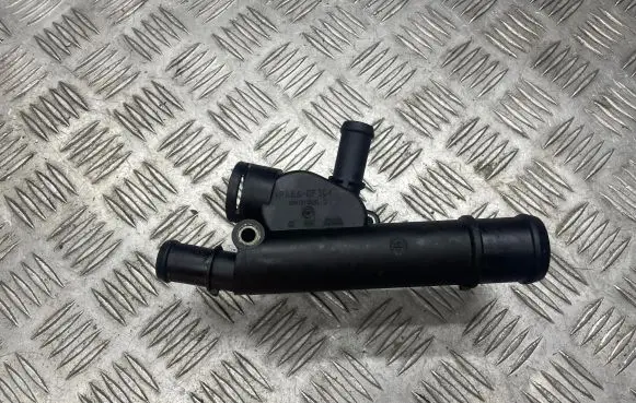 Thermostat/thermostat housing