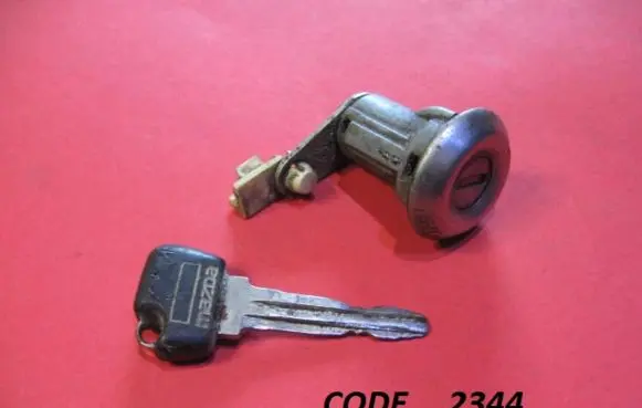 Mazda 626 Front door lock (next to the handle) 2344