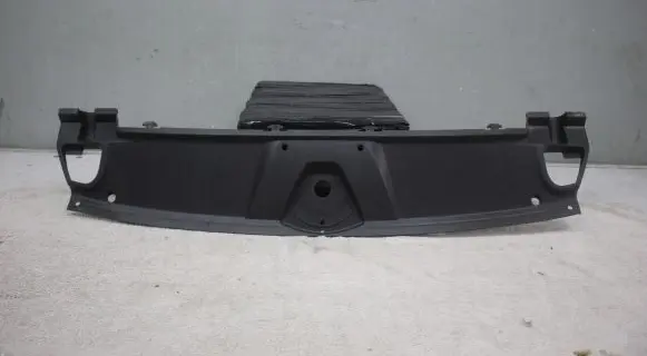 Engine bonnet/hood lock trim molding