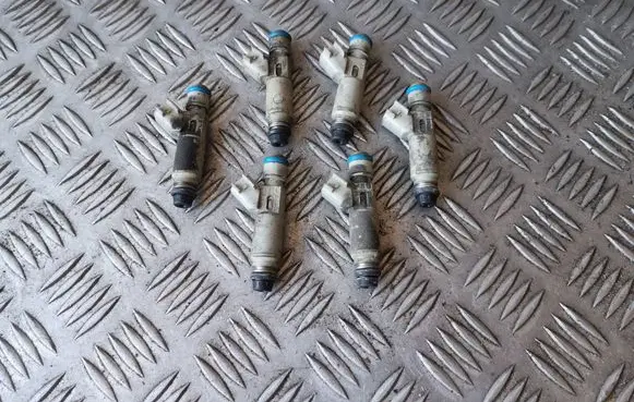Ford Mondeo Mk III Fuel injectors set 1S7EF7B