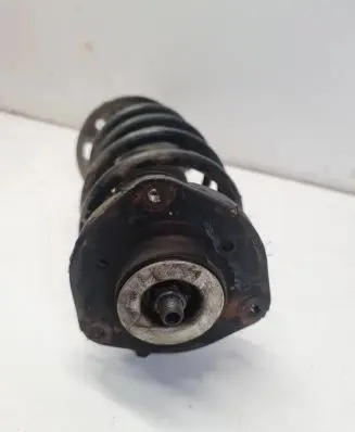 Volkswagen Jetta V Front shock absorber with coil spring 1K0400040