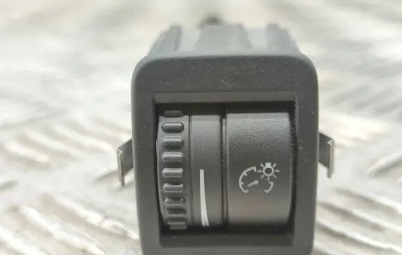 Panel lighting control switch
