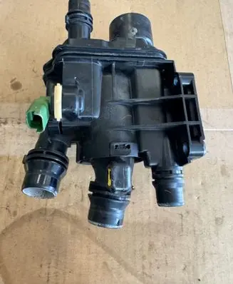 Thermostat/thermostat housing