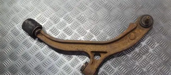 Chrysler Voyager Front lower control arm/wishbone 04694973aa