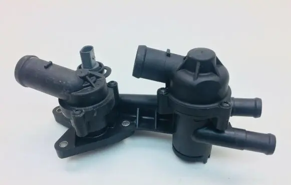 Thermostat/thermostat housing