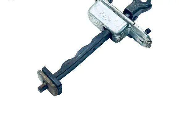 Front door check strap stopper