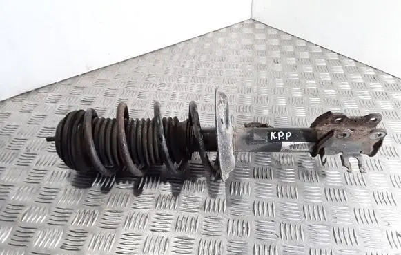 Opel Corsa D Front shock absorber with coil spring