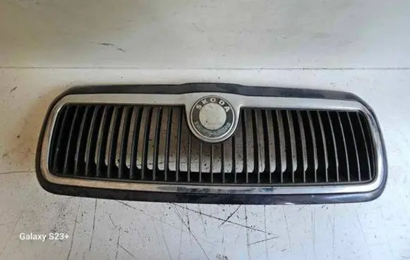 Skoda Octavia Mk1 (1U) Front bumper upper radiator grill 1U0853651