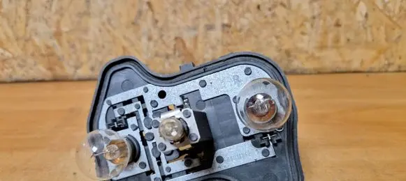 Volkswagen Golf V Tail light bulb cover holder 89031828