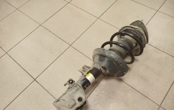 Subaru Outback (BS) Front shock absorber with coil spring 