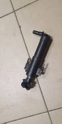 Headlight washer spray nozzle