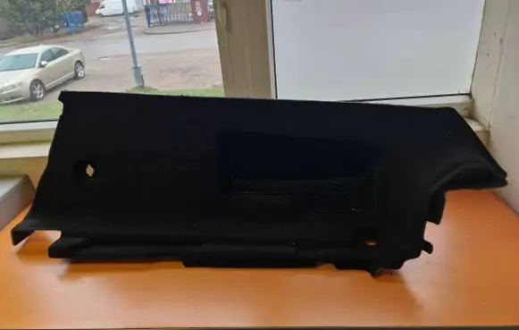Trunk/boot lower side trim panel