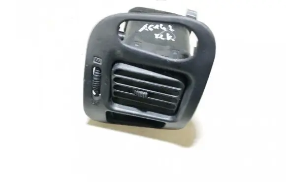 Mitsubishi Lancer Dash center air vent grill