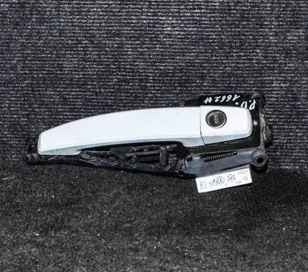 Opel Astra J Front door exterior handle 13577482