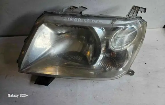 Suzuki Grand Vitara II Headlight/headlamp 10059076