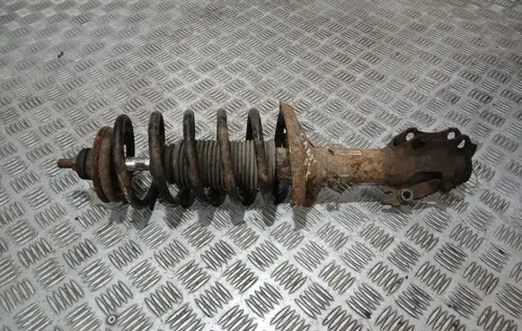 Volkswagen Caddy Front shock absorber with coil spring 