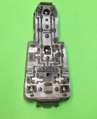 Tail light bulb cover holder