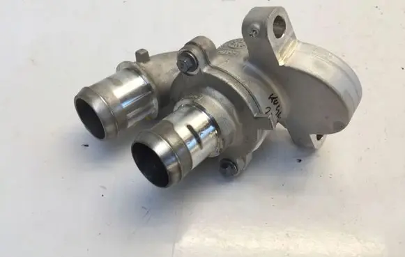 Thermostat/thermostat housing