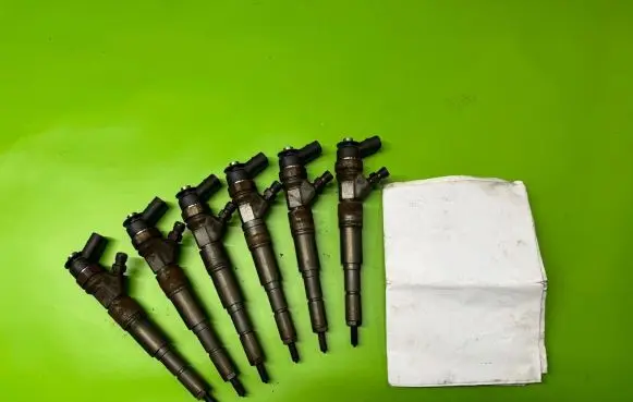 BMW 5 E60 E61 Fuel injector 7794435 0445110209