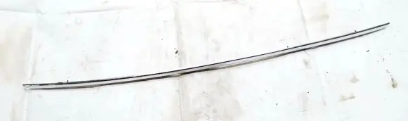 Trunk door license plate light bar