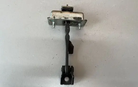 Opel Corsa E Front door check strap stopper 13242975