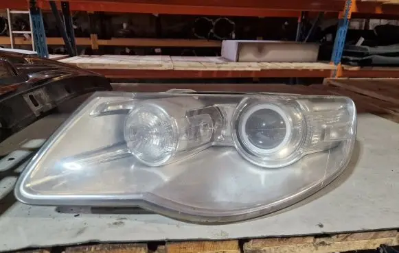 Volkswagen Touareg I Headlight/headlamp 7L6941031C