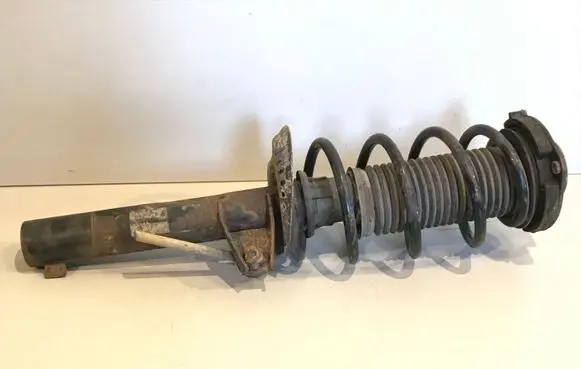 Volkswagen Golf V Front shock absorber with coil spring 1K0413031BE