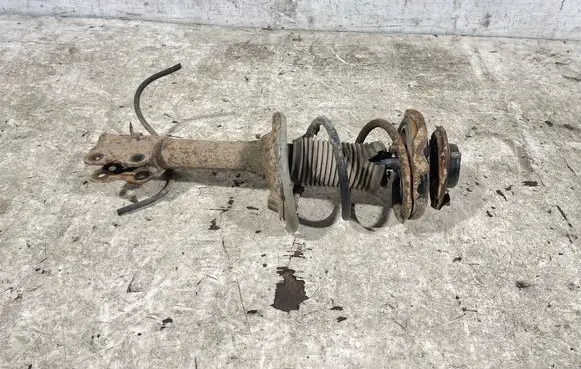 Nissan X-Trail T30 Front shock absorber with coil spring