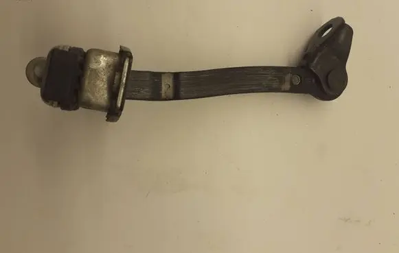 Front door check strap stopper