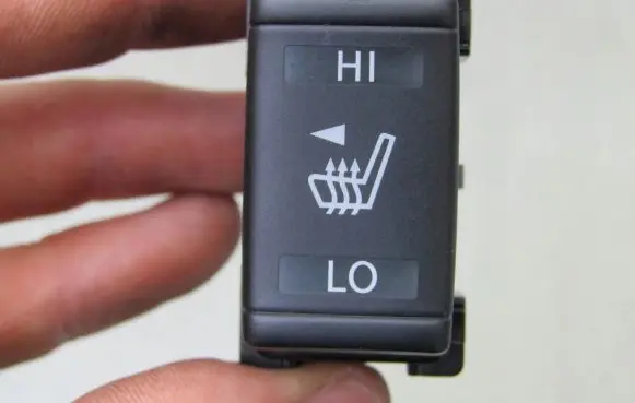 Nissan Leaf II (ZE1) Seat heating switch