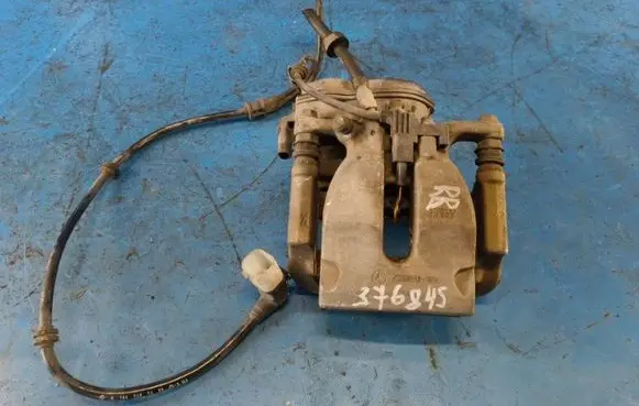 Mercedes-Benz GL X166 Front brake caliper A1664230481